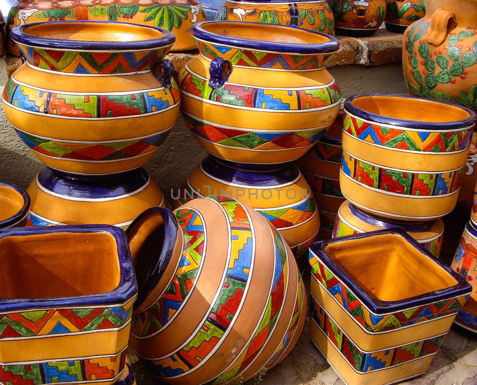 Talavera pots with traditional Mexican designs by emattil