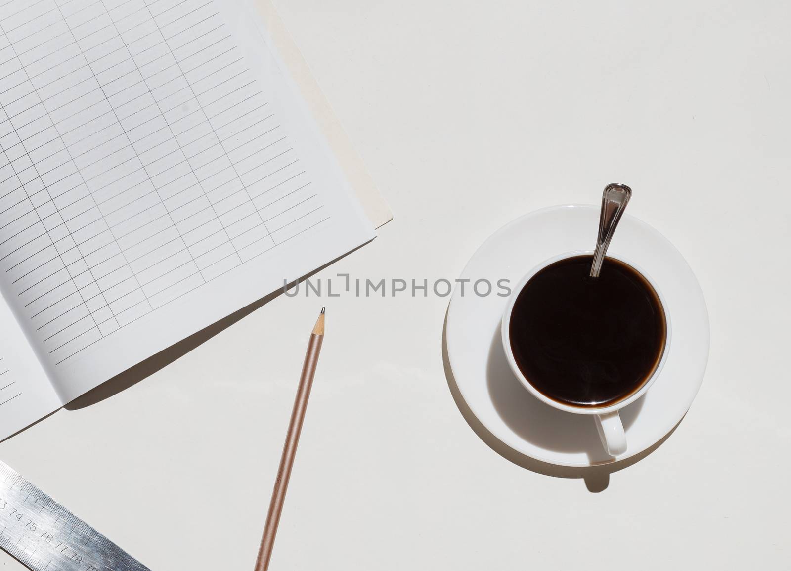 Office desk table supplies and coffee cup. On white background