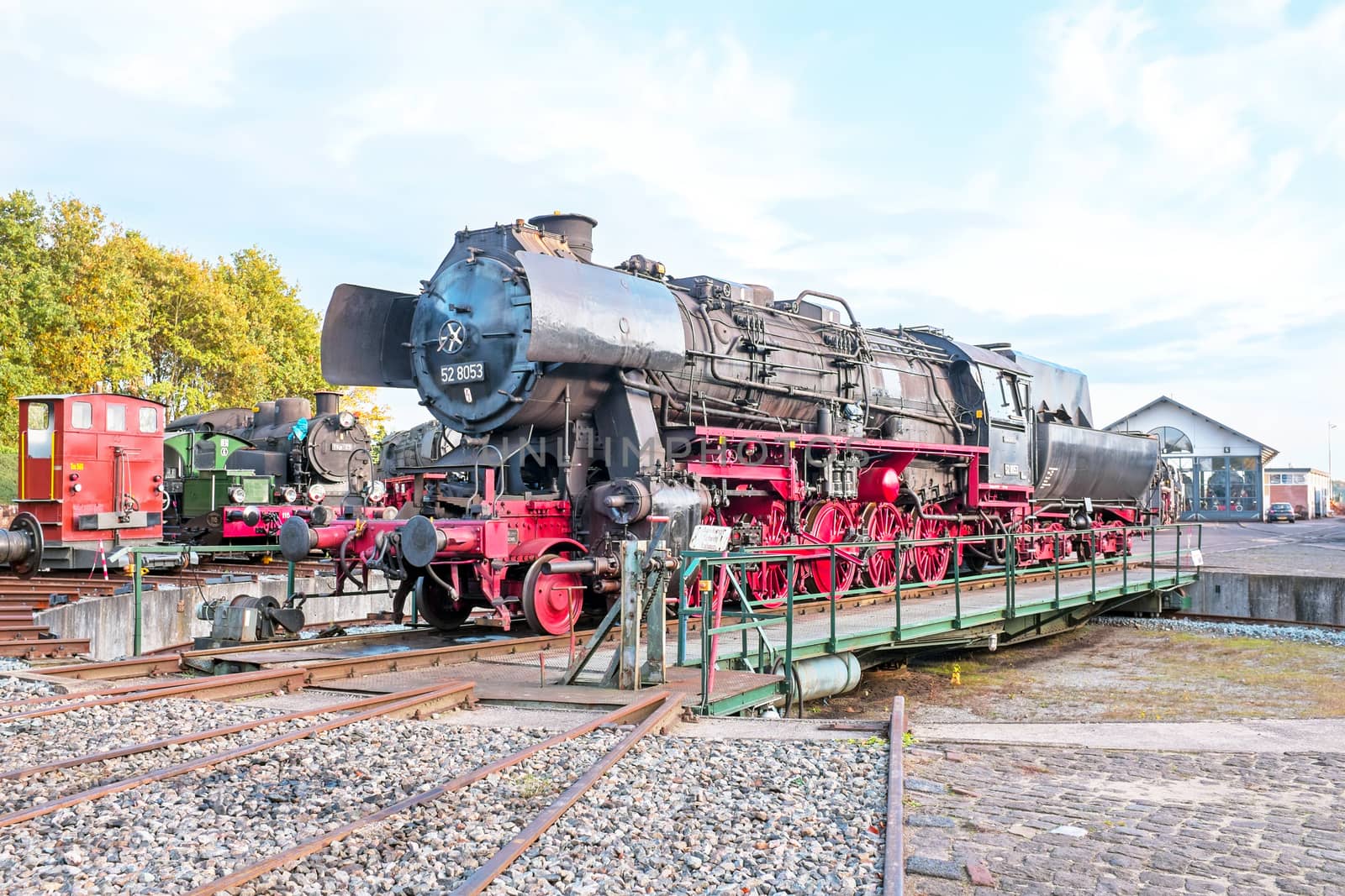 Antique steam locomotive in depot