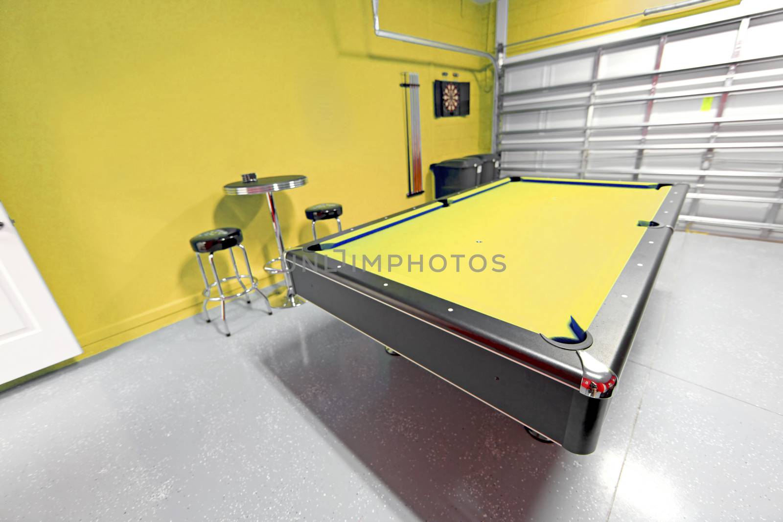 A Games Room with Pool Table in a Garage