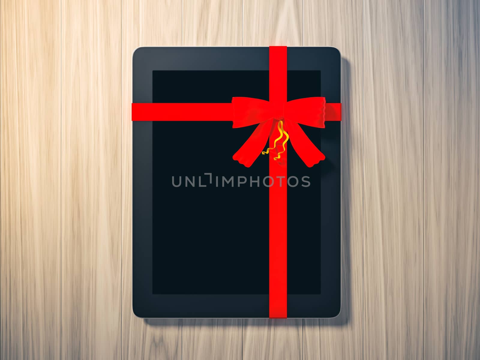 tablet wrapped with color ribbon by teerawit