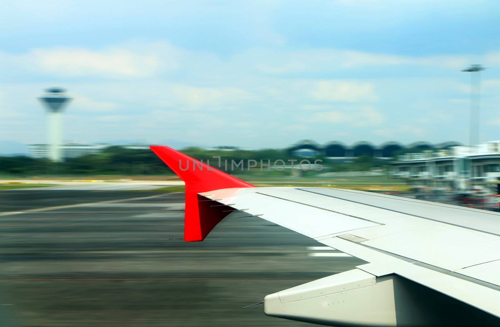 Airplane take off from window view with blur motion by razihusin