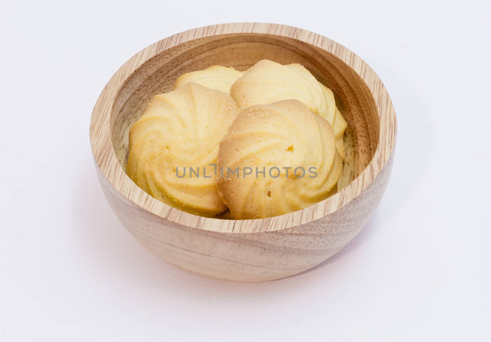 Butter cookies in wooden bowl