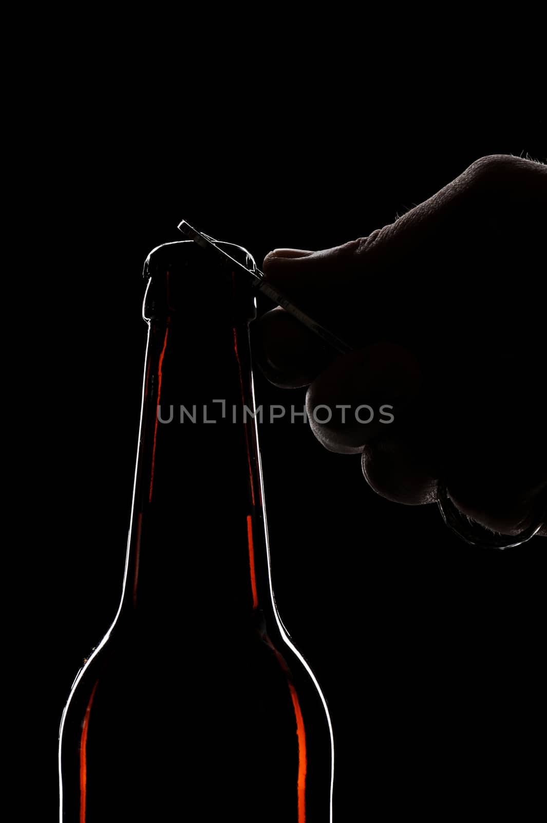 beer bottle open close up with hand black 