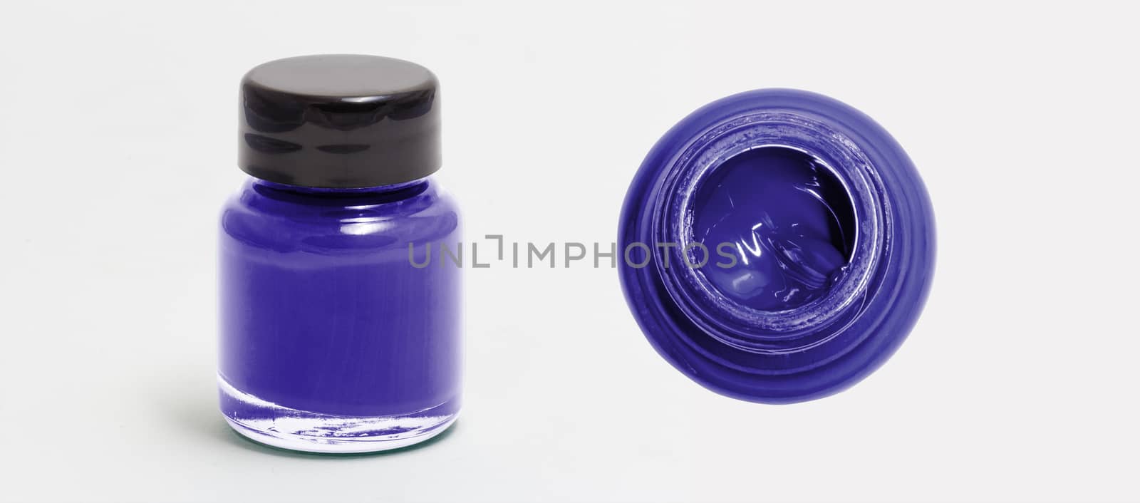 darkslateblue acrylic color bottle side and top view white isolated with clipping path