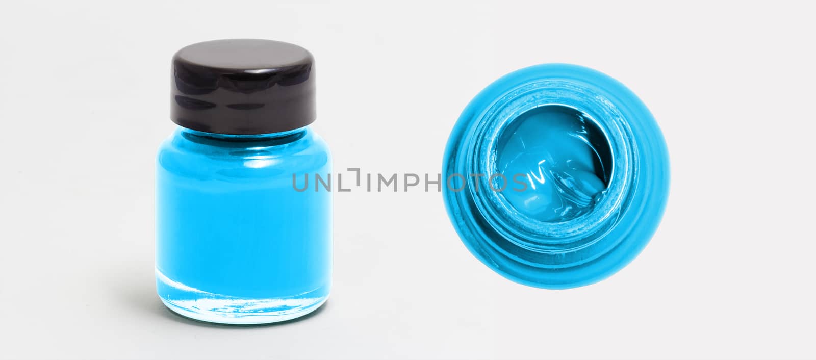 deepskyblue acrylic color bottle side and top view white isolated with clipping path