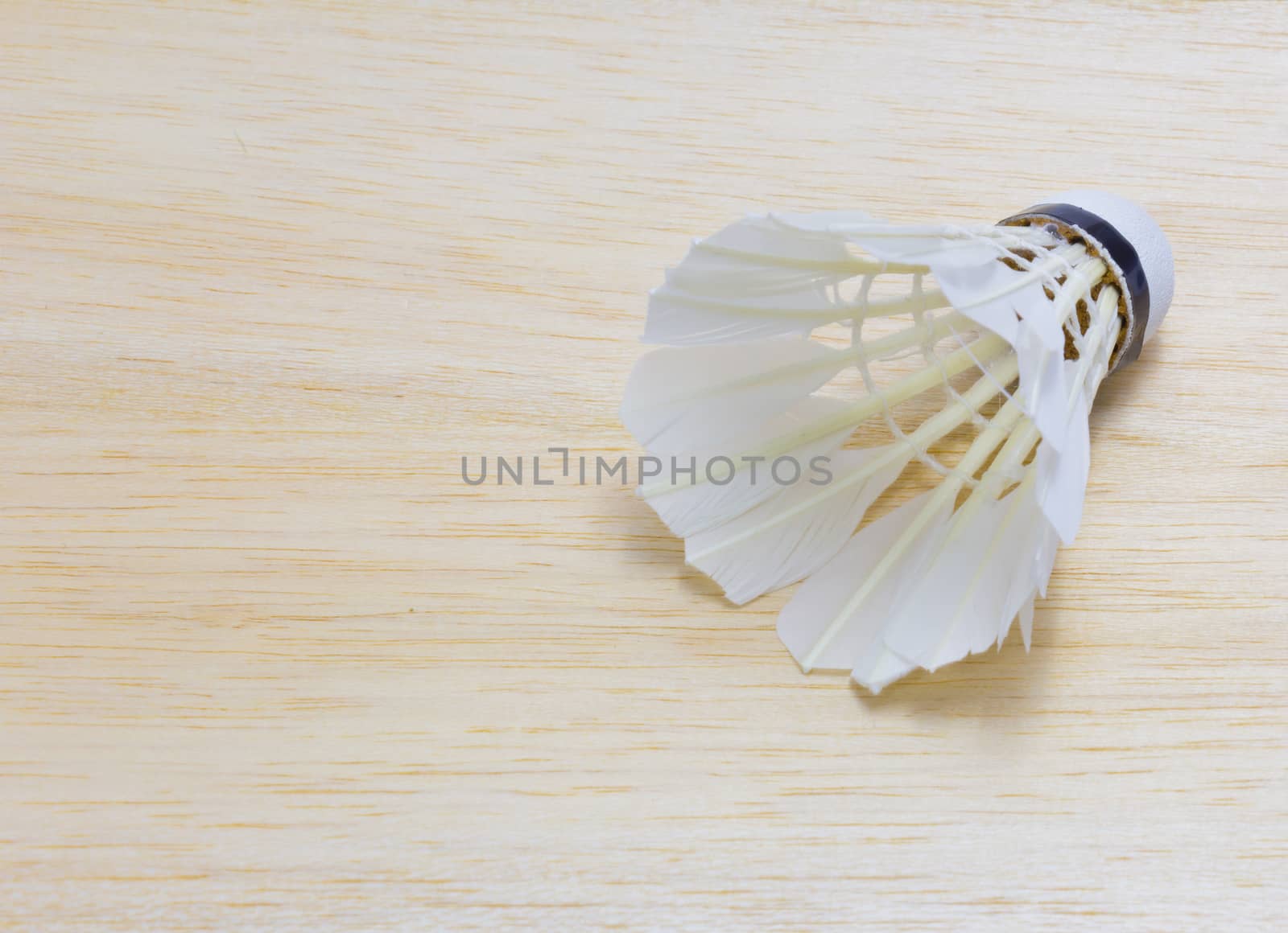 shuttlecock on wood background