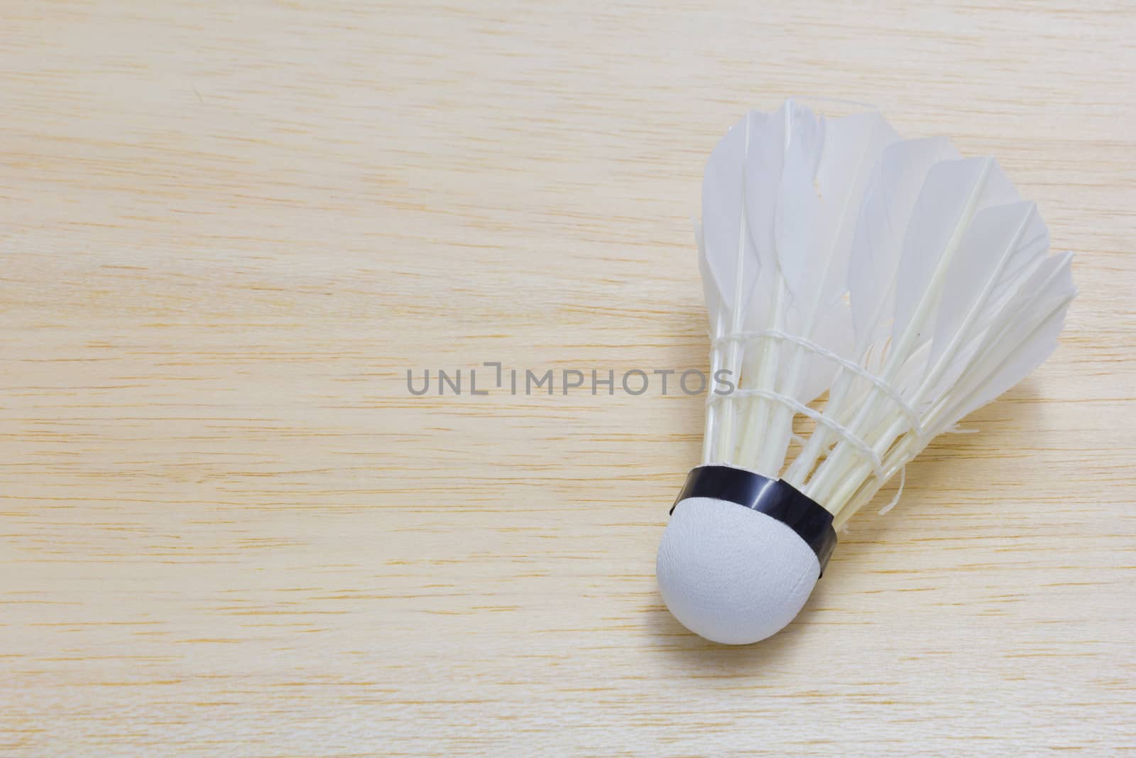 shuttlecock on wood background