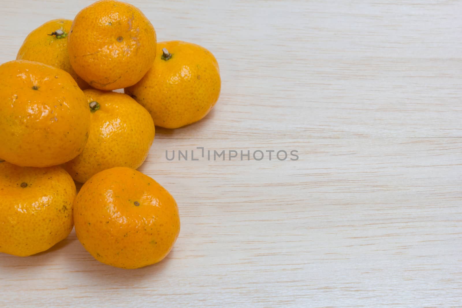 orange on wood background