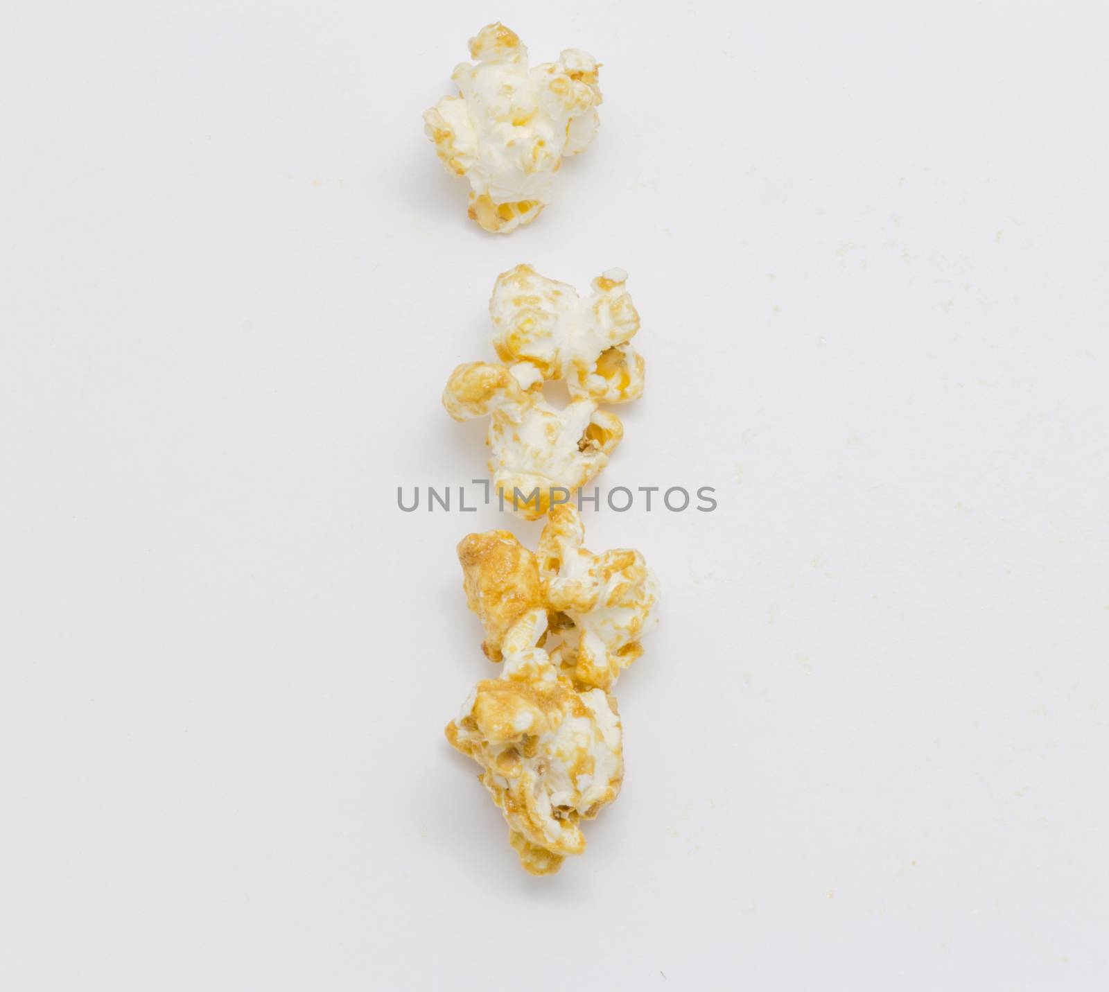 pop corn forming letter I isolated on white background