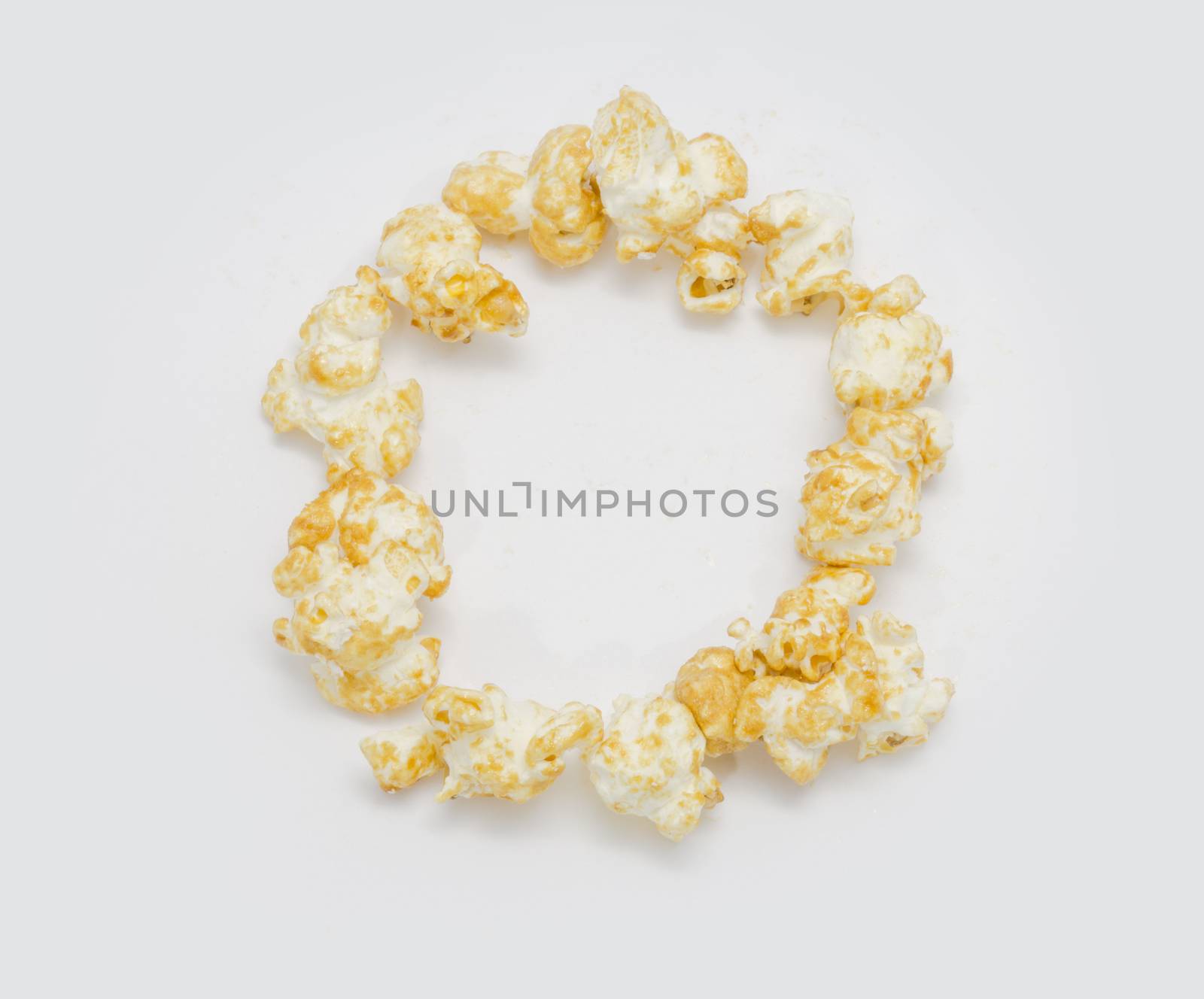 pop corn forming letter O isolated on white background
