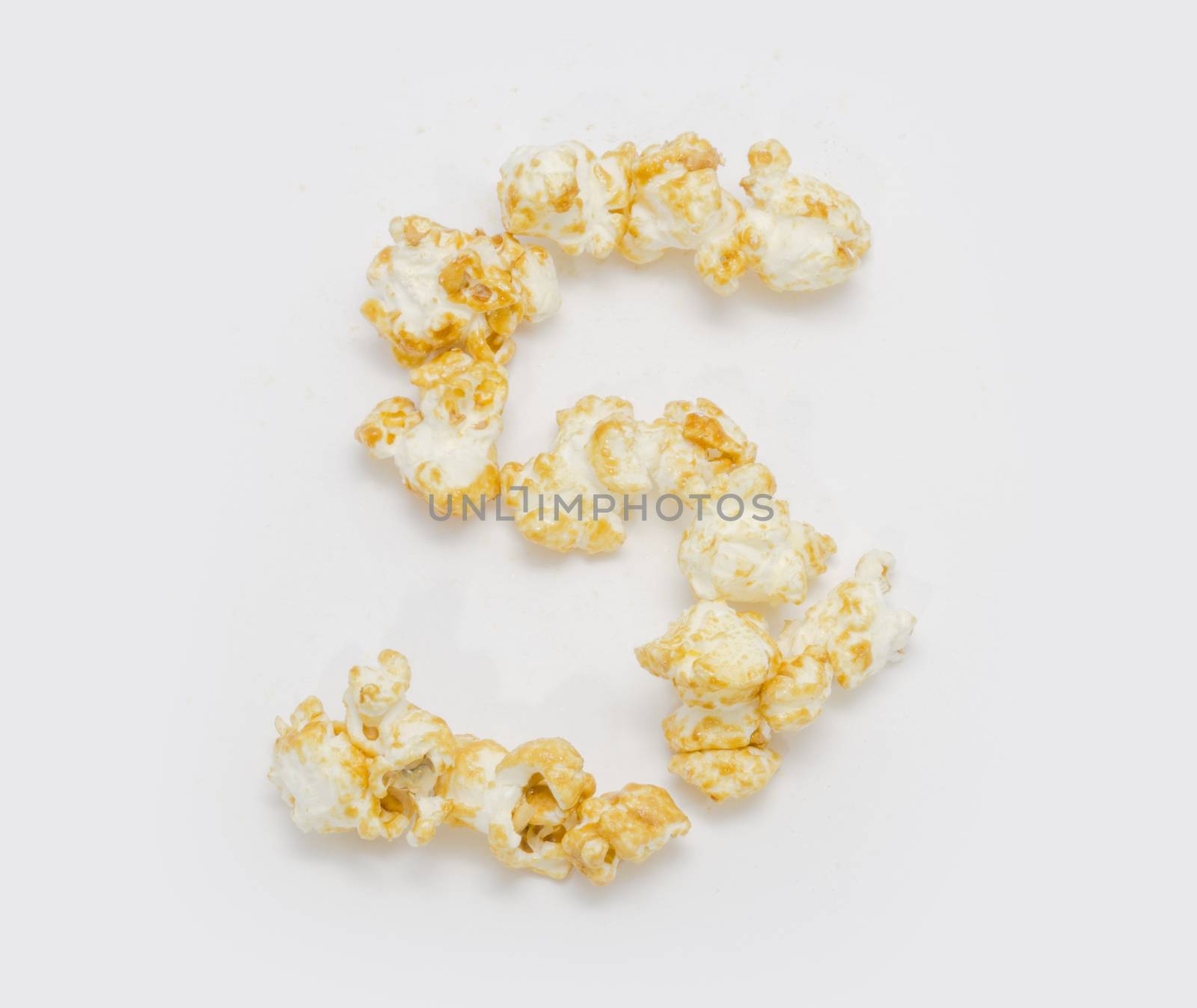 pop corn forming letter S isolated on white background