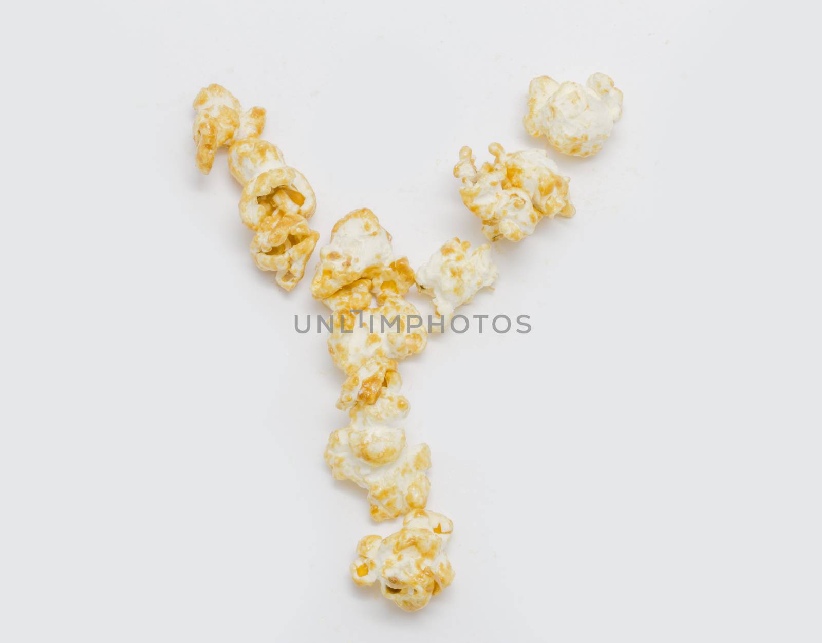 pop corn forming letter Y isolated on white background