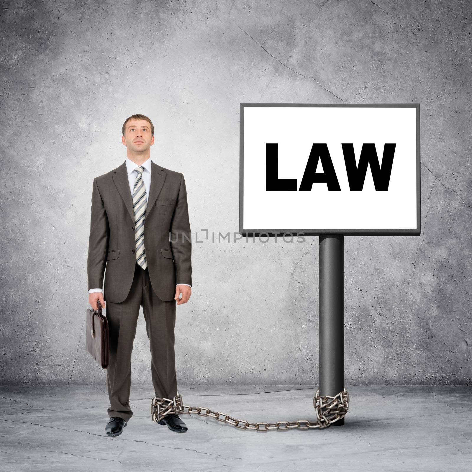 Businessman word law on post sign with chain