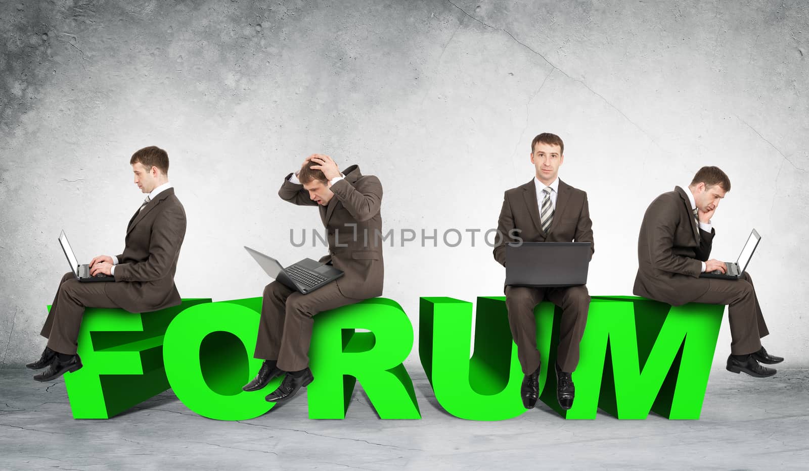 Set of businessmen working on laptop and sitting on word job on grey wall background