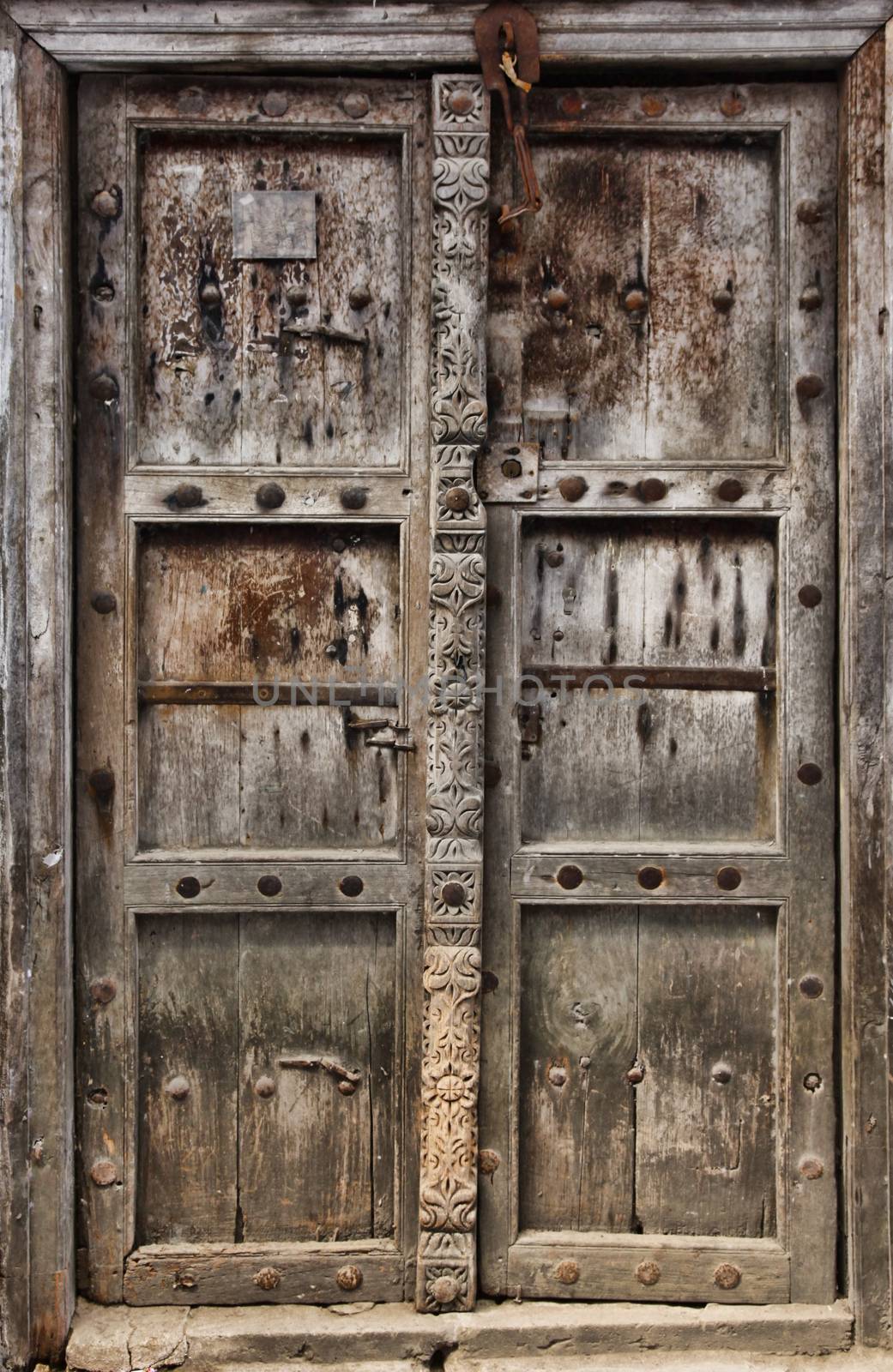 Old wooden door at Stone Town the capital of Zanzibar island East Africa. Zanzibar