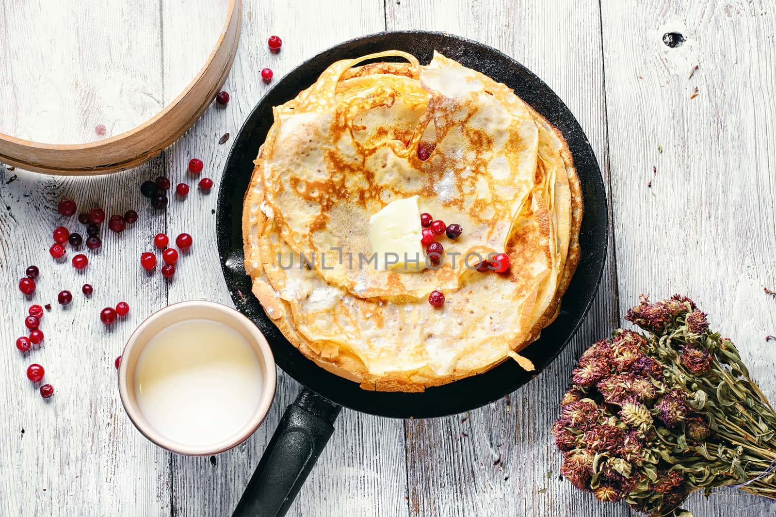 Cooking homemade pancakes by LMykola