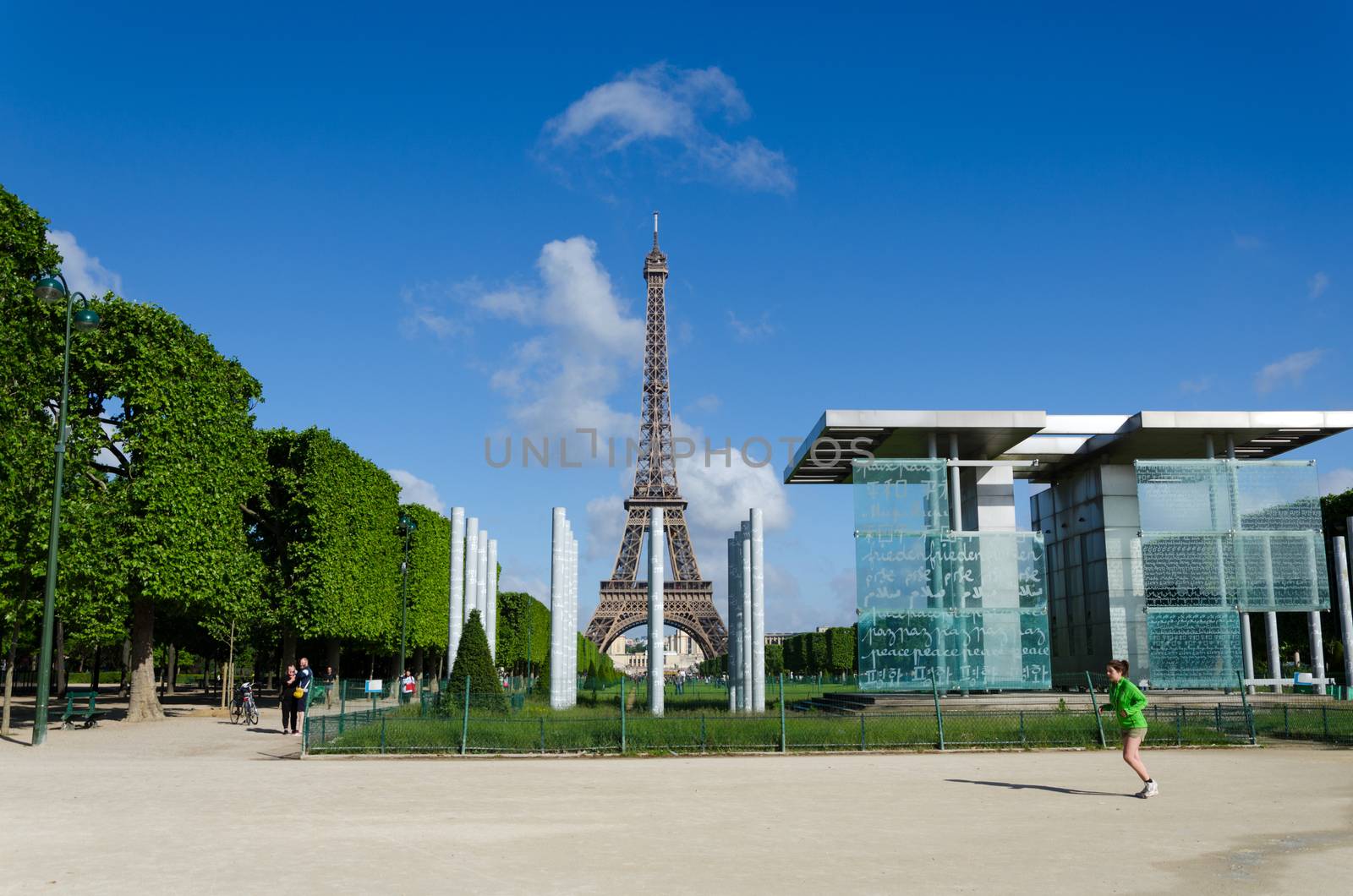 Paris, France - May 15, 2015: People around The Wall for Peace on the Champs de Mars by siraanamwong