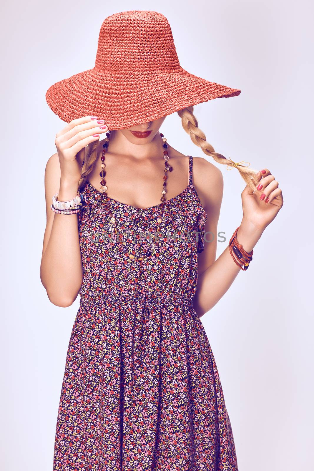 Hippie boho woman in hat. Beauty young playful positive blonde, pigtails, ethnic accessories relax, having fun. Floral sundress, romantic style. Attractive loving girl. Unusual creative,people