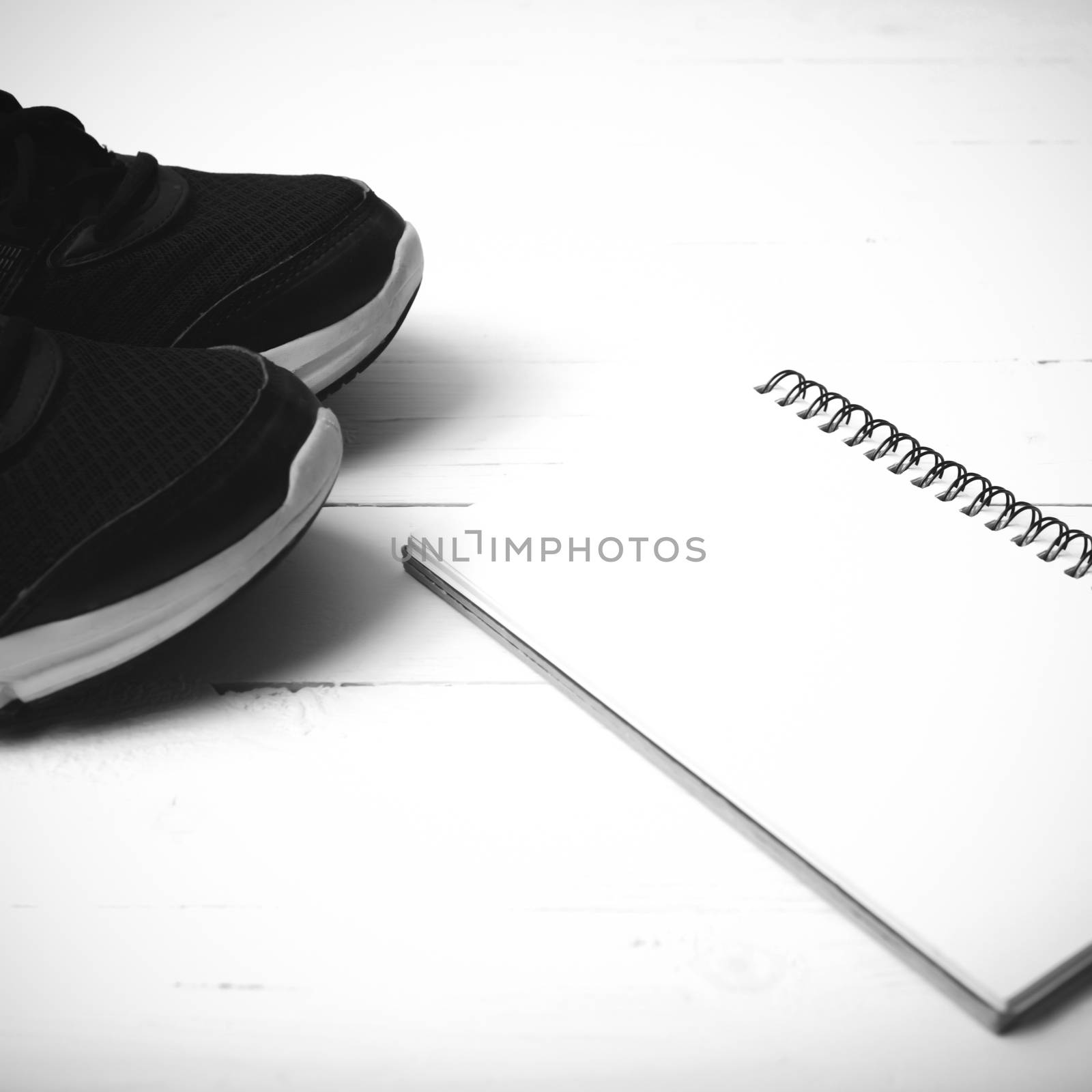 running shoes and notepad black and white tone color style by ammza12