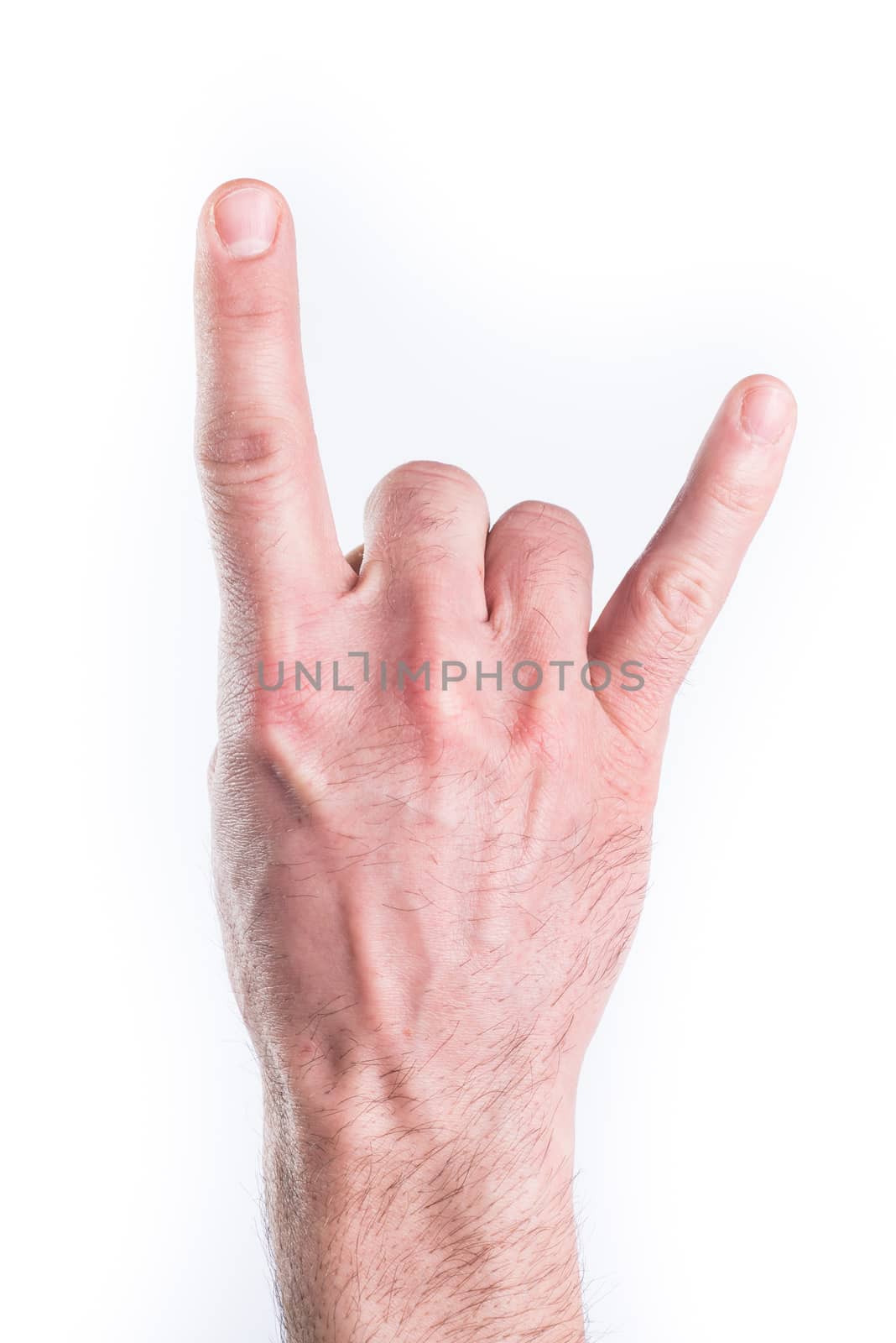 Man's hand miming horns on white background