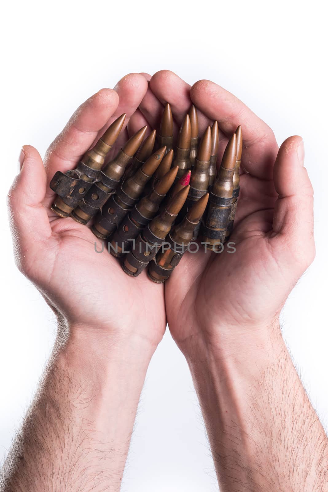 Concept hands giving bullets on white background