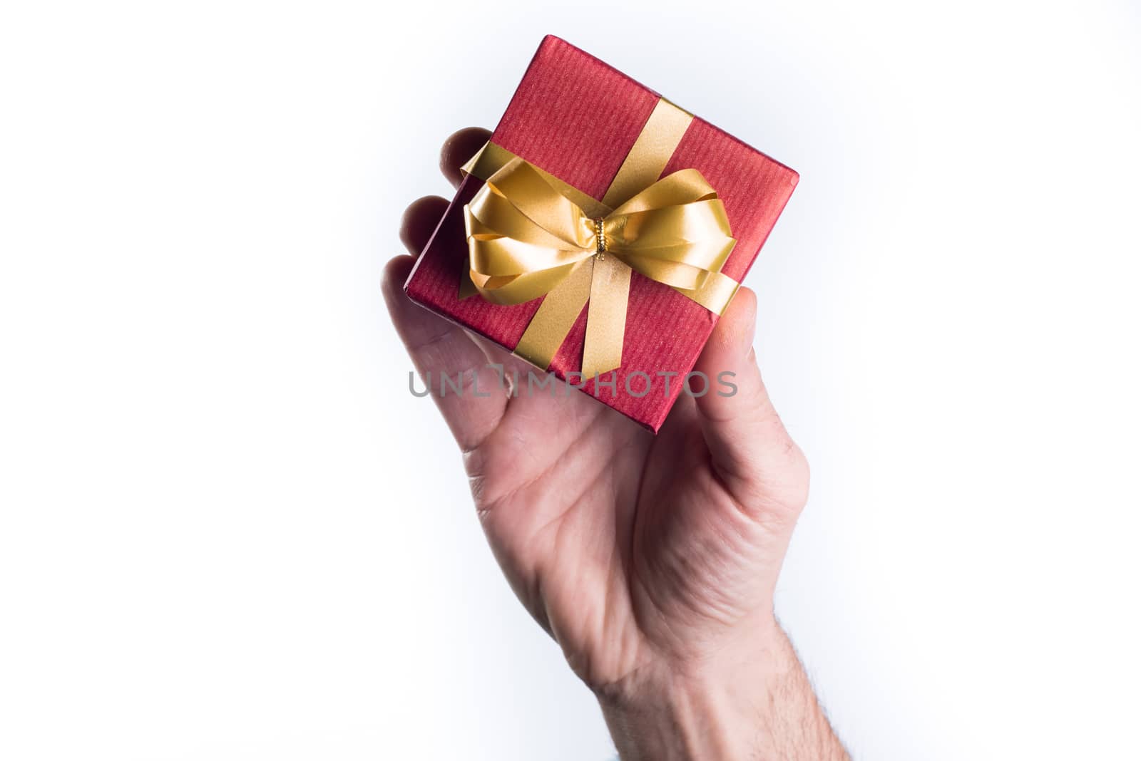 Concept hands giving gift on white background