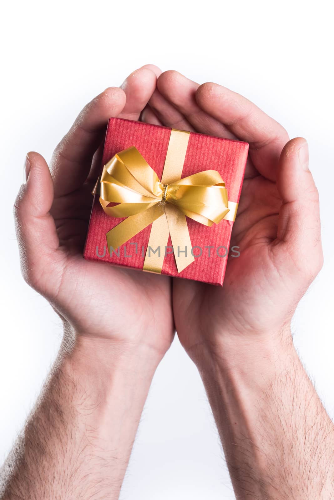 Concept hands giving gift on white background