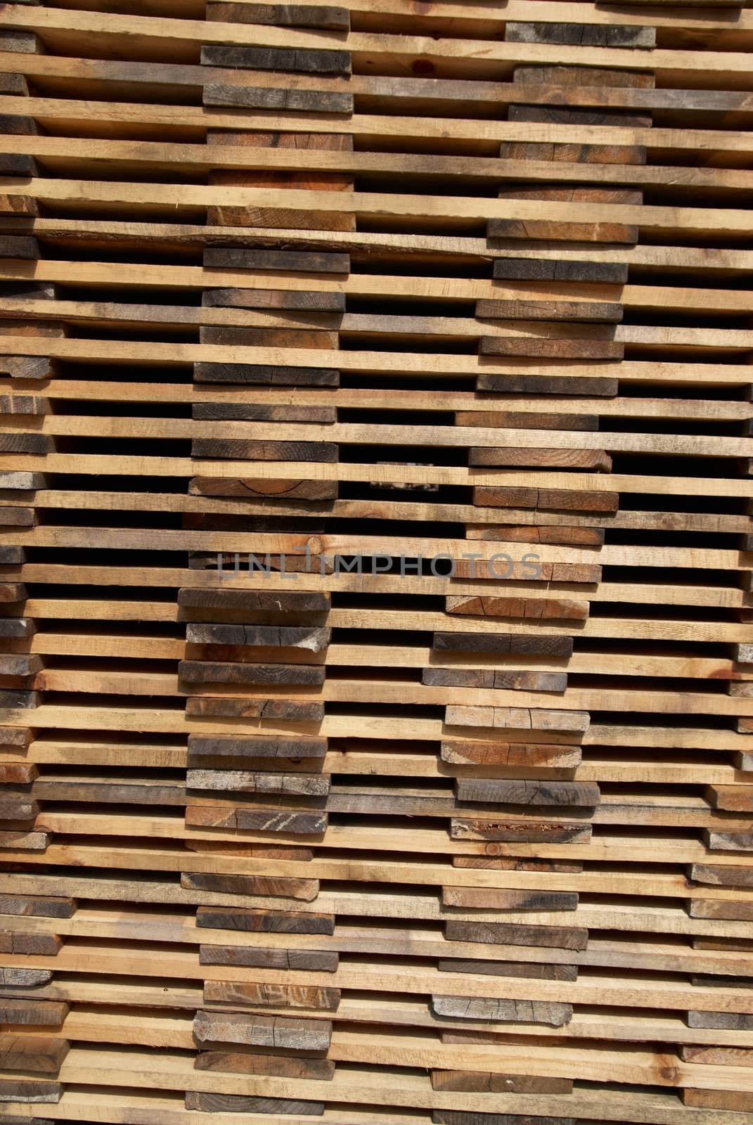 Stack of wooden boards by vapi