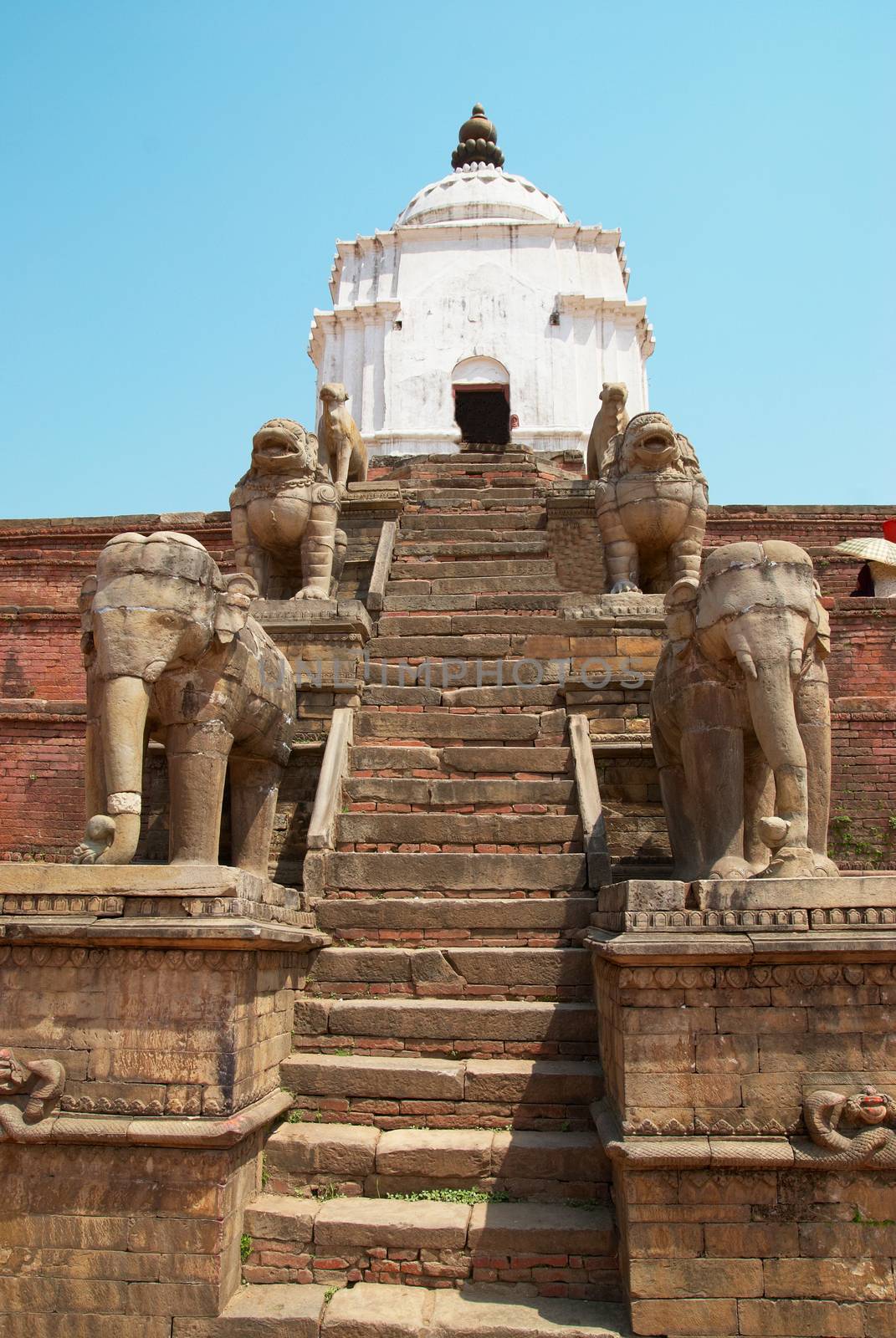 Old buddhistic statues on Bhaktapur Square. Kathmandu, Nepal