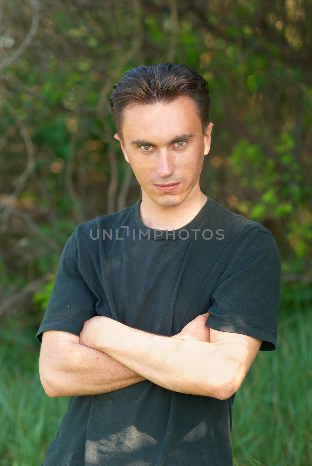 Man staying in the forest with soft background