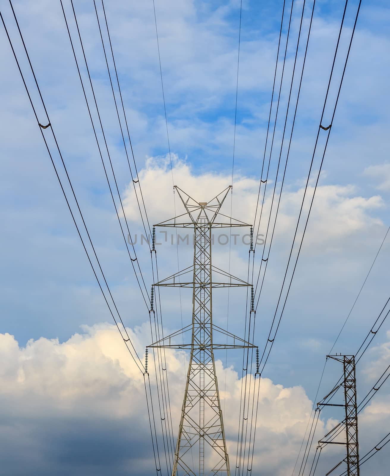 Electricity post in the evening with blue sky.