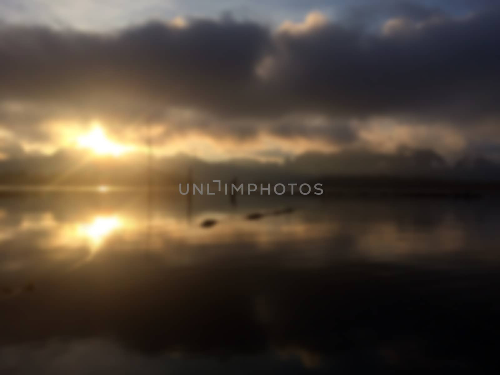 Sunrise reflection on the water.