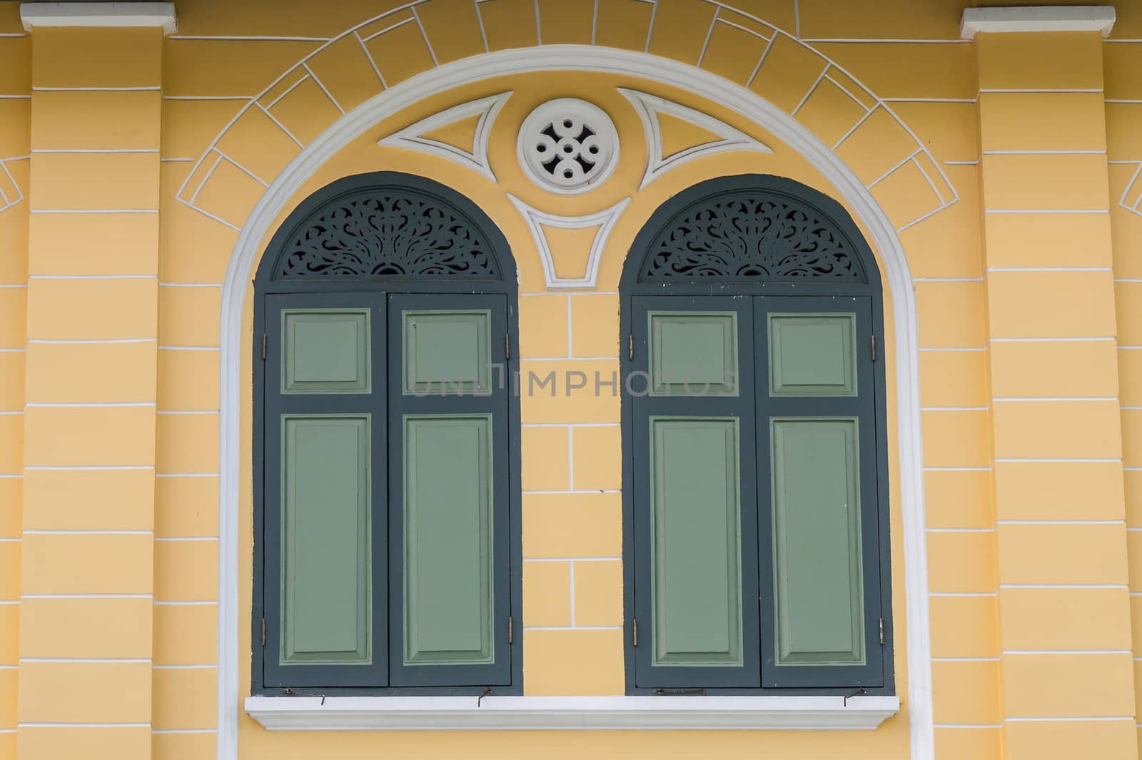 Retro windows in the center of Bangkok, Thailand.