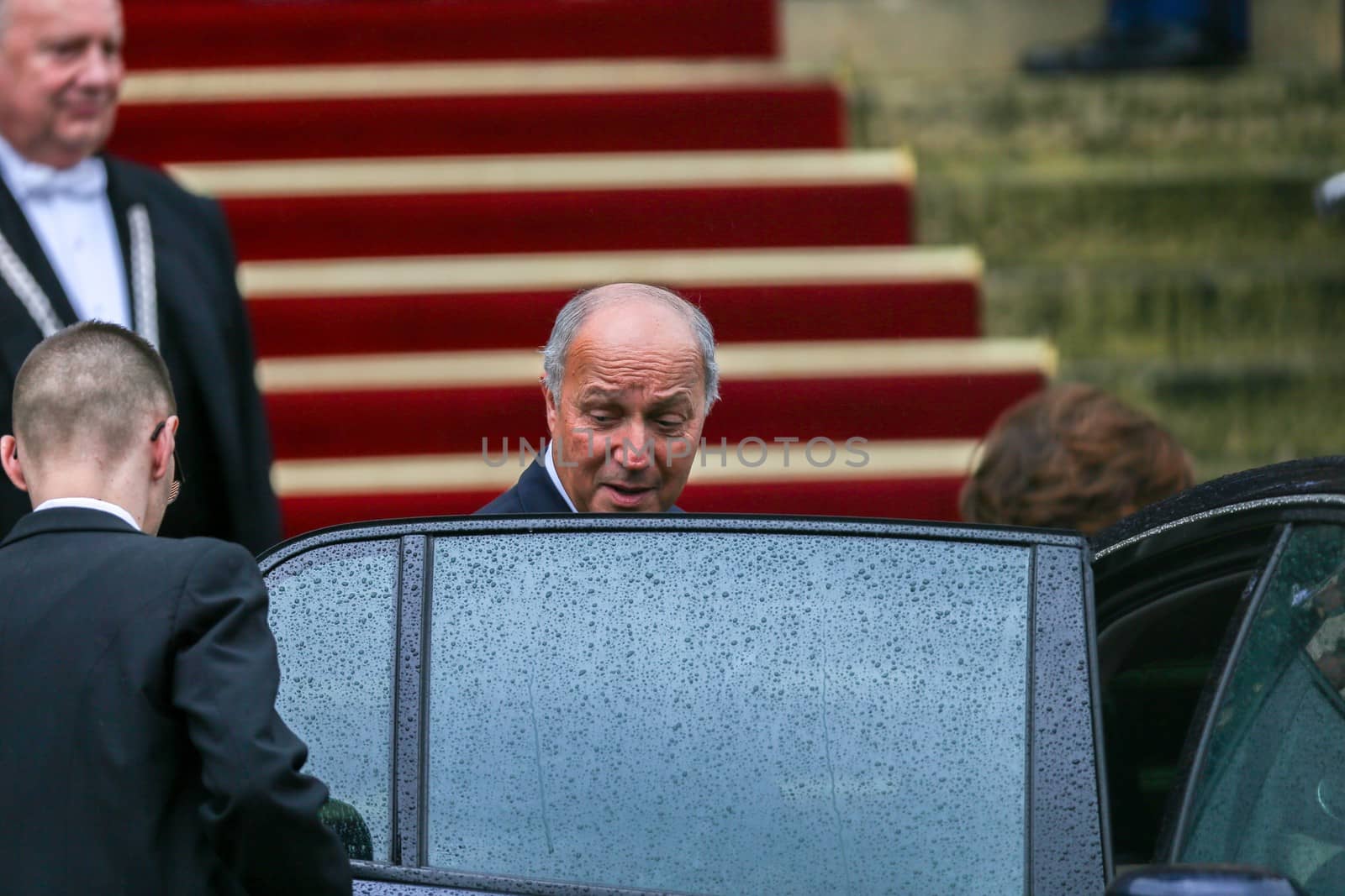 FRANCE, Paris: Newly appointed French Foreign Minister Jean-Marc Ayrault (R) escorts France's outgoing Foreign Minister Laurent Fabius (L) following the handover ceremony at the Foreign Ministry on February 12, 2016 in Paris during which Former PM Jean-Marc Ayrault became new French foreign minister. French President Francois Hollande reshuffled his cabinet on February 11, 2016, naming Jean-Marc Ayrault foreign minister and adding several ecologists to government as he seeks to widen his political base ahead of a presidential poll in 2017. 