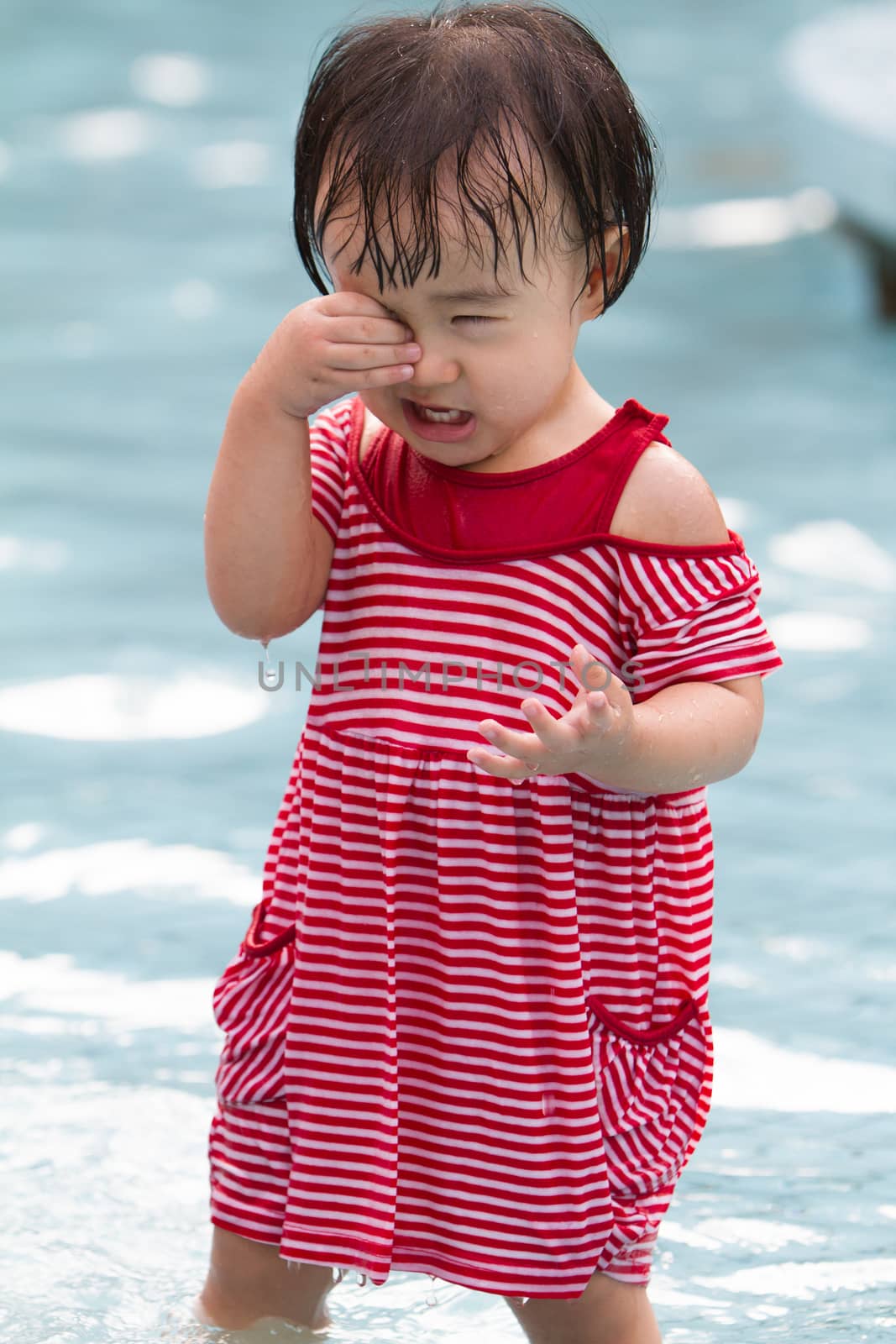 Chinese Little Girl Playing in Water by kiankhoon