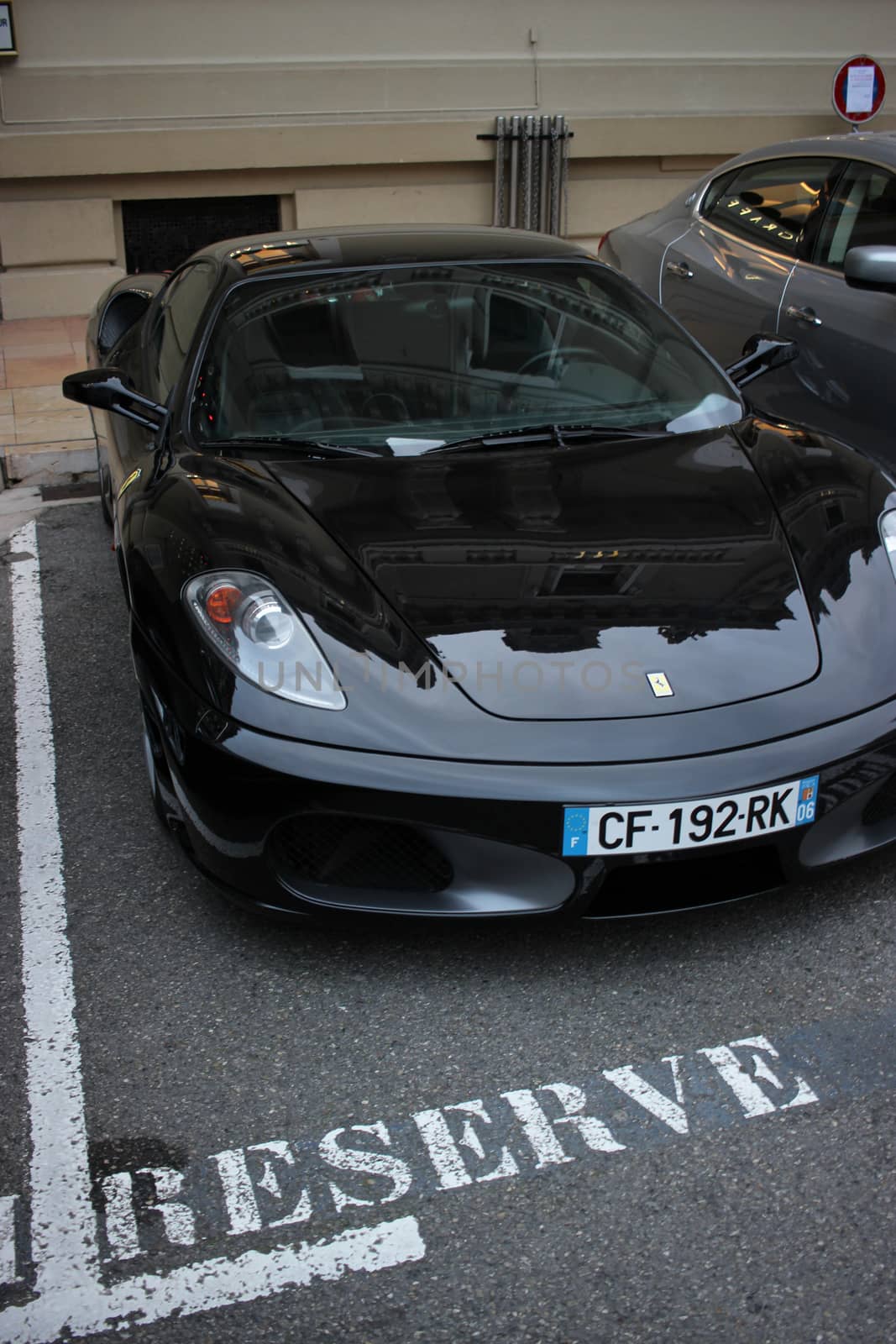 Ferrari Parked in a Reserved Parking Space by bensib