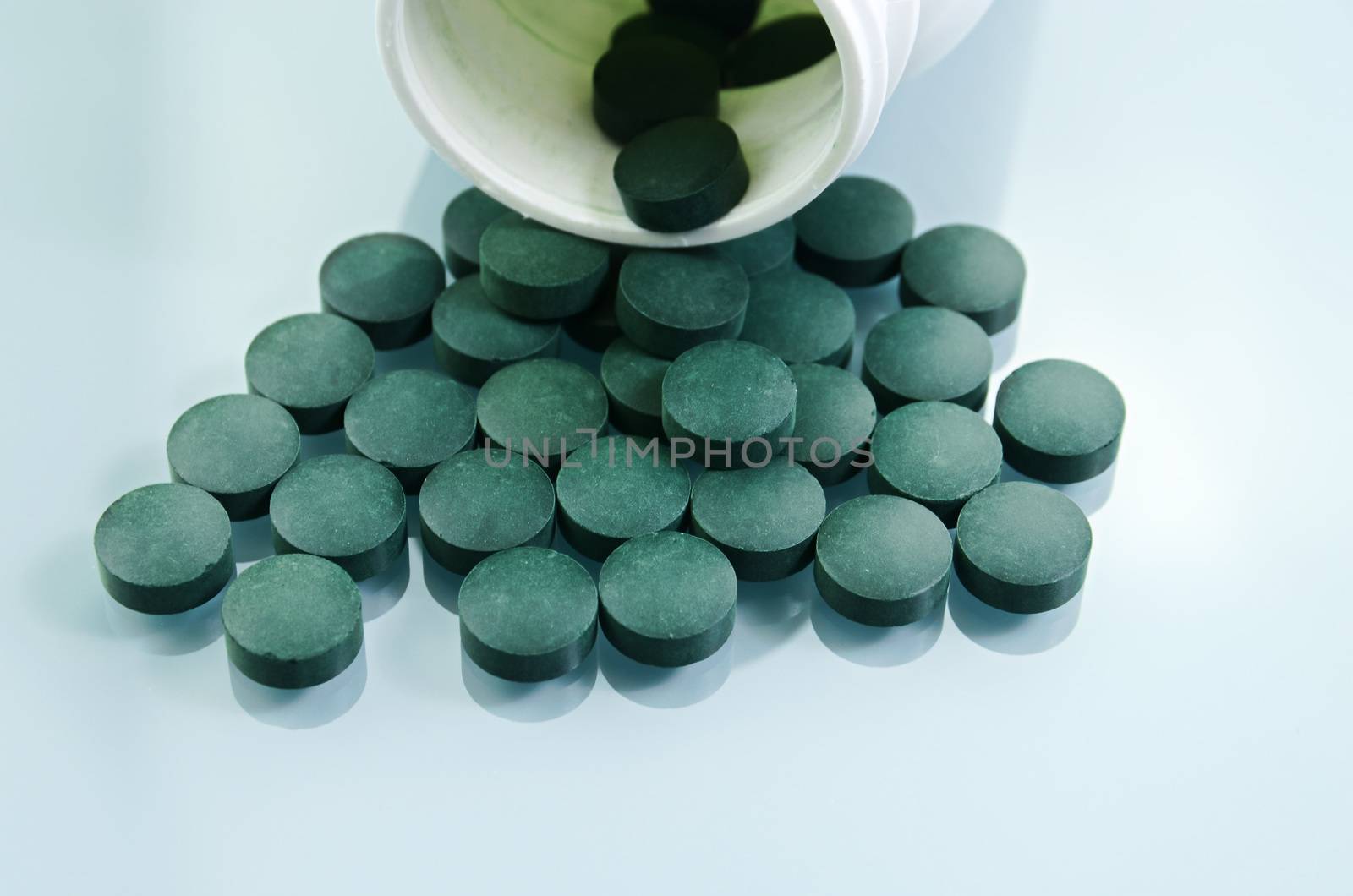 Spirulina supplements in tablet, made from blue green algae 

