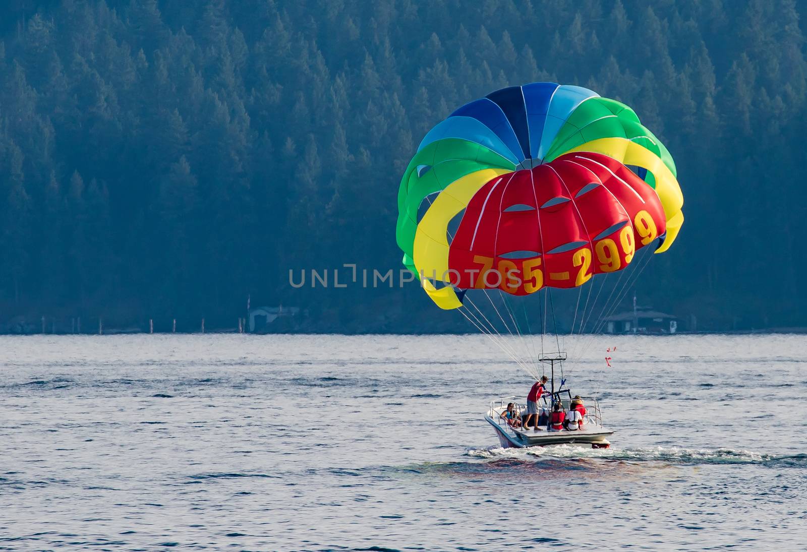 Parasailing Over Lake Coeur d'Alene by teacherdad48@yahoo.com