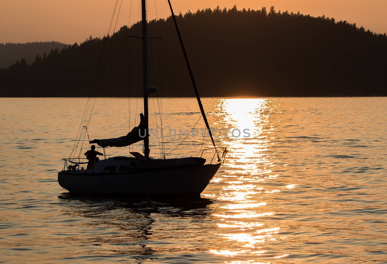 Sailing Lake Coeur d'Alene at Sunset