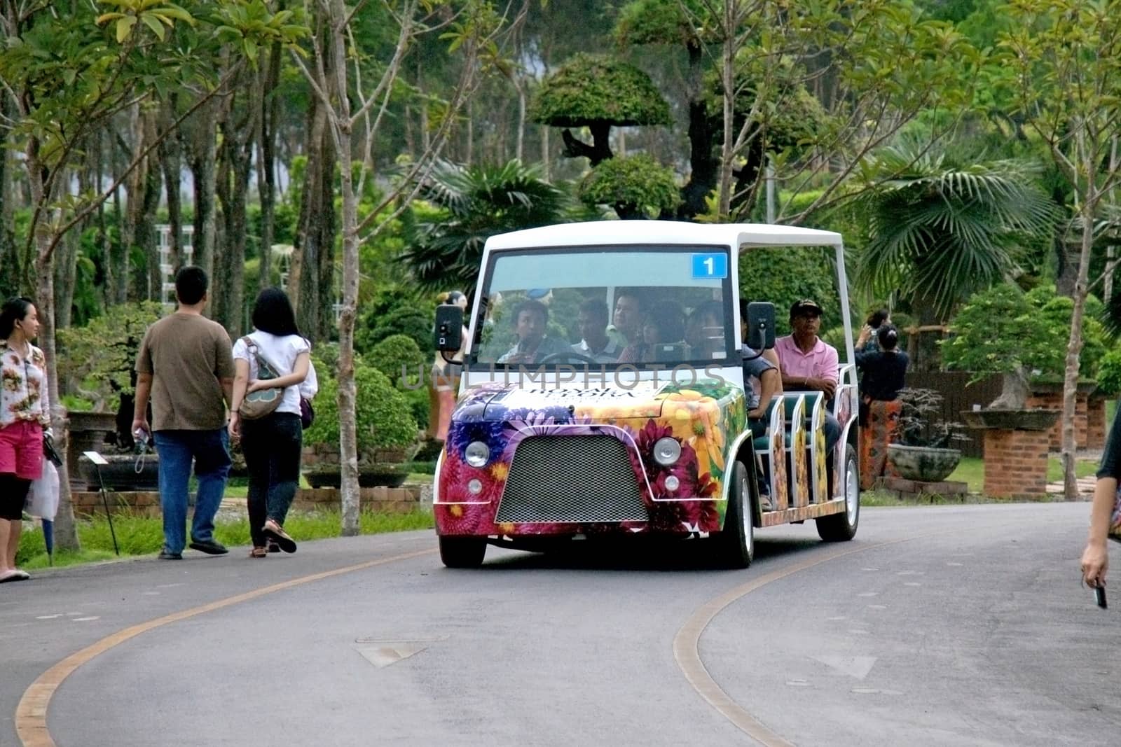 CHIANGMAI, THAILAND - MARCH 13 2012: Shuttle bus service in area of Royal Flora Ratchapruek Park.