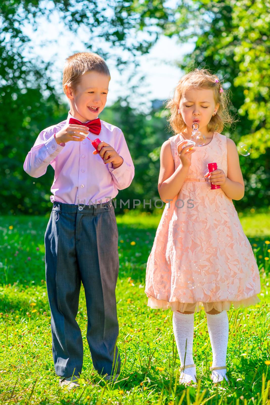 funny kids on a holiday makes soap bubbles by kosmsos111