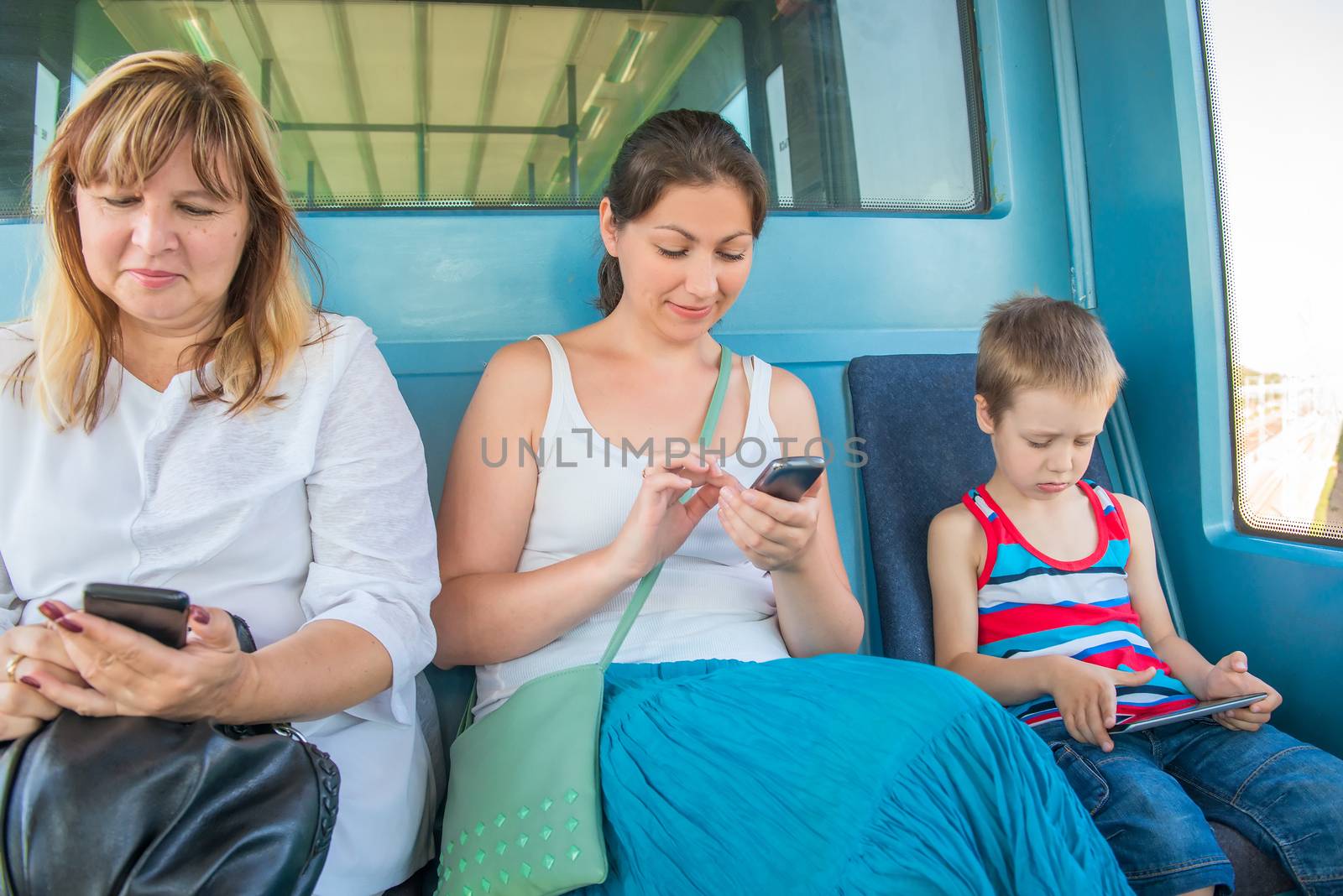 Passengers sitting in the train light metro