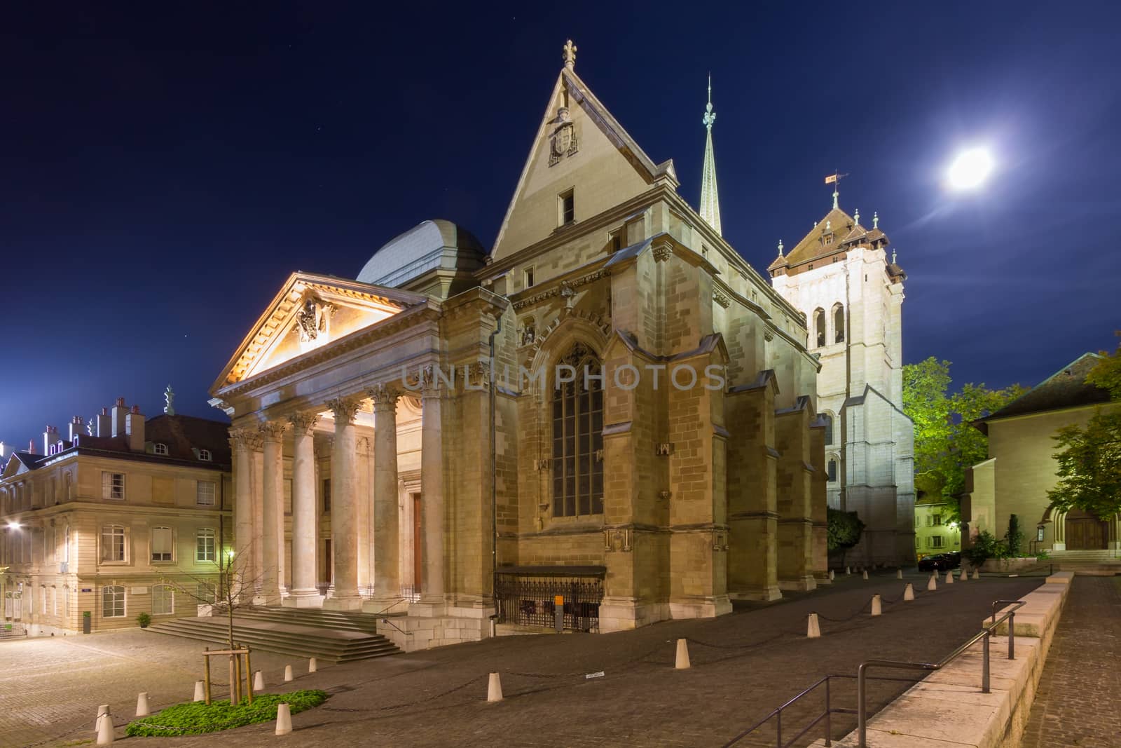 Side view of the St. Pierre Cathedral in Geneva's old town, on a full moon night.