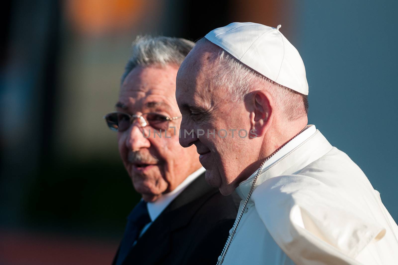 CUBA, Havana: Pope Francis walks side-by-side with Cuban President Raul Castro (L) shortly after his arrival at Jose Marti airport in Havana, Cuba on February 12, 2016. The pope's arrival would be followed immediately by a historic meeting with Russian Orthodox Patriarch Kirill.