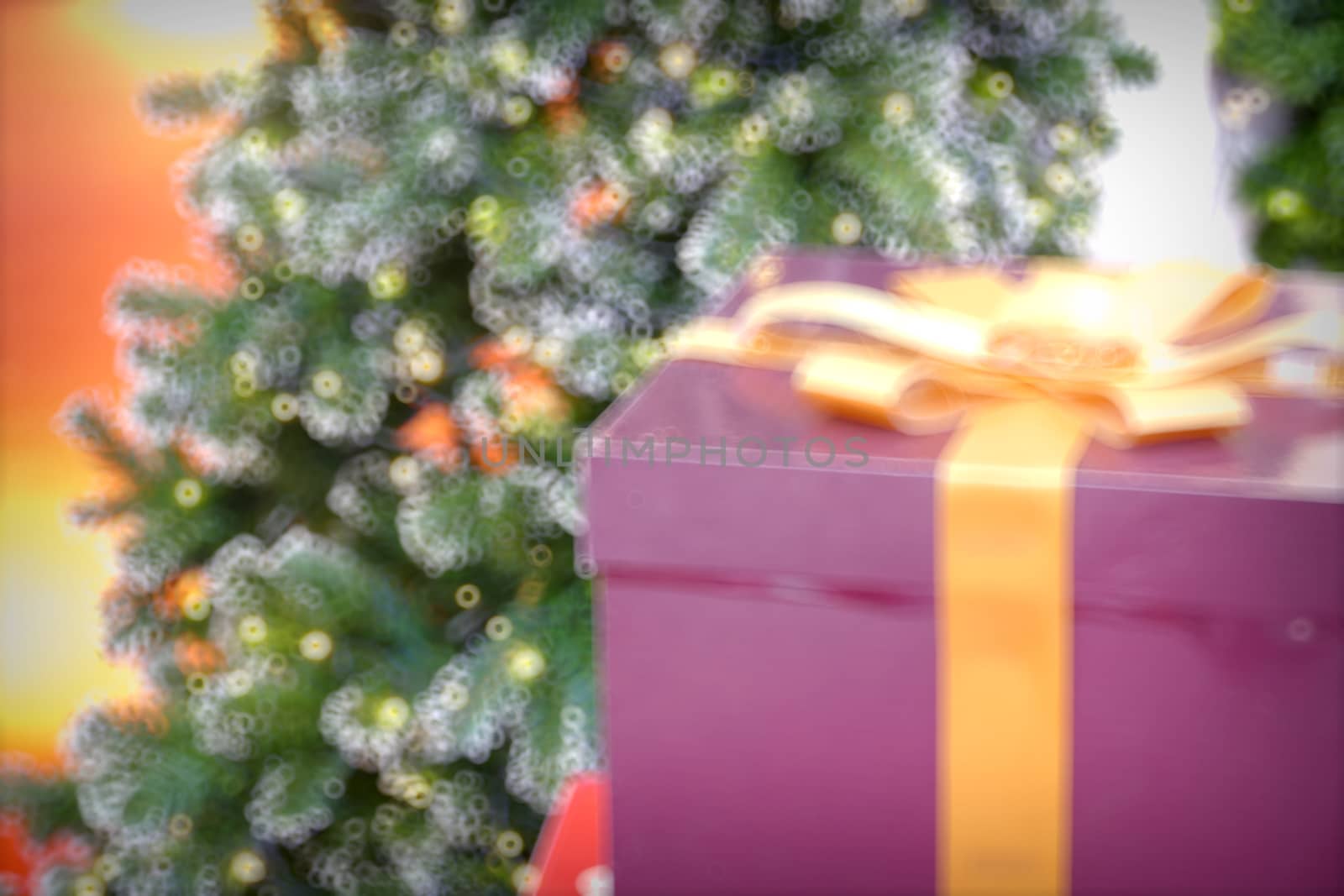 Gold Christmas background of de-focused lights with decorated tree, Christmas background 