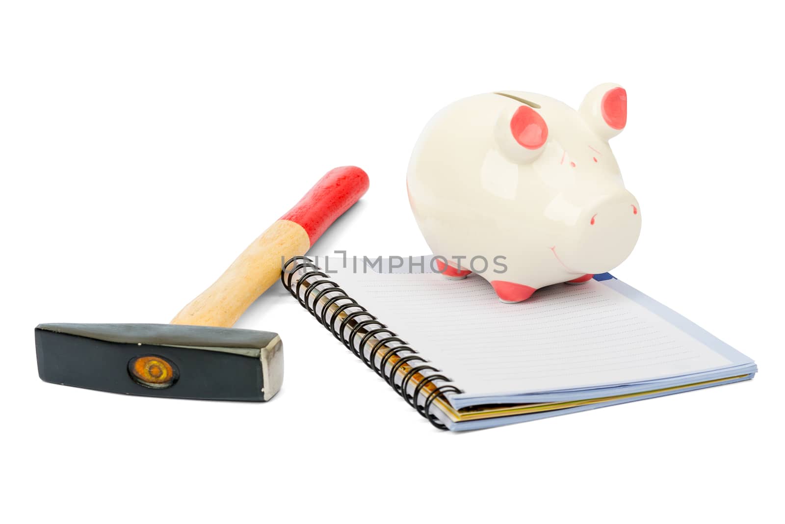 Piggy bank with hammer on white by cherezoff