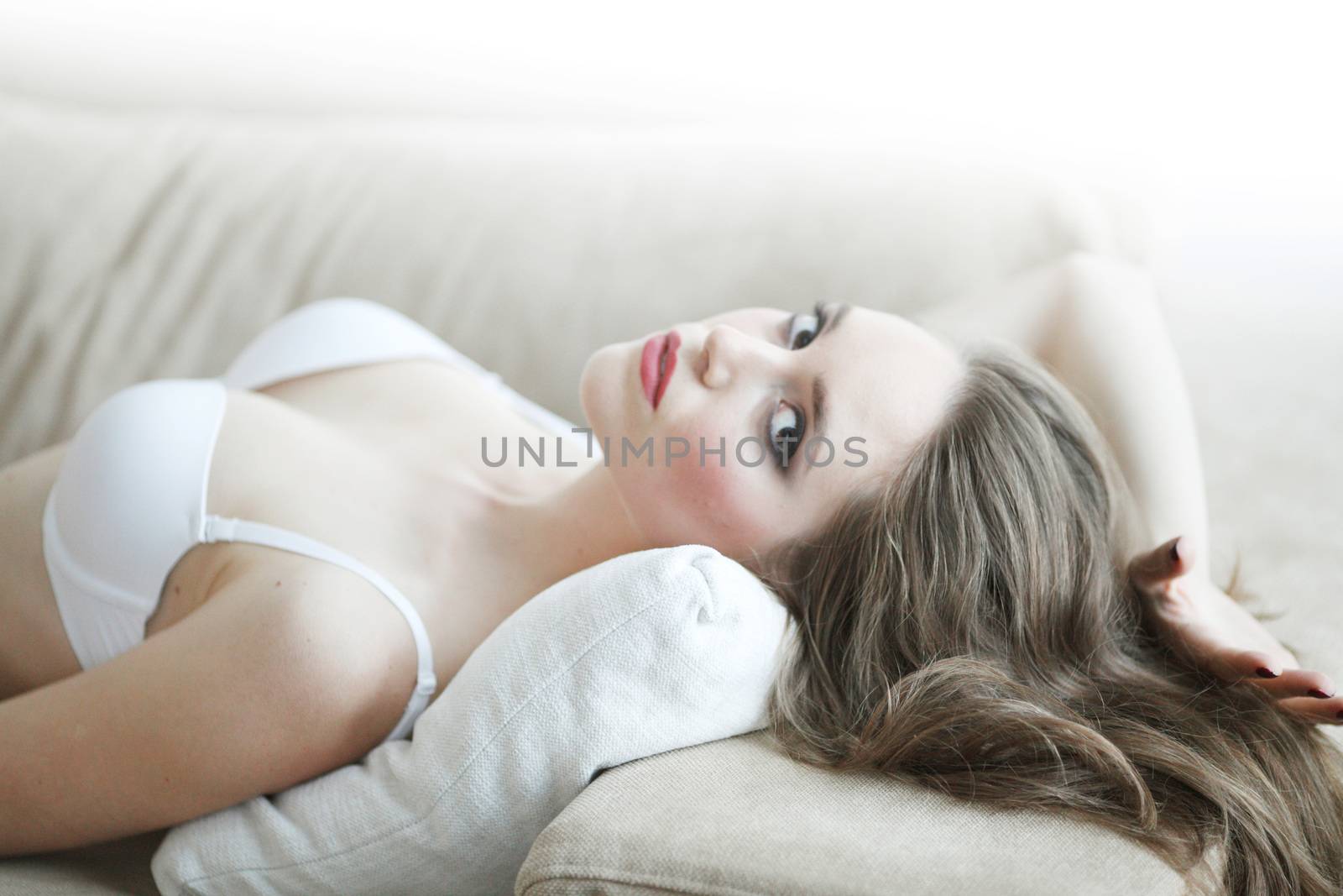 Portrait of woman in lingerie by ALotOfPeople