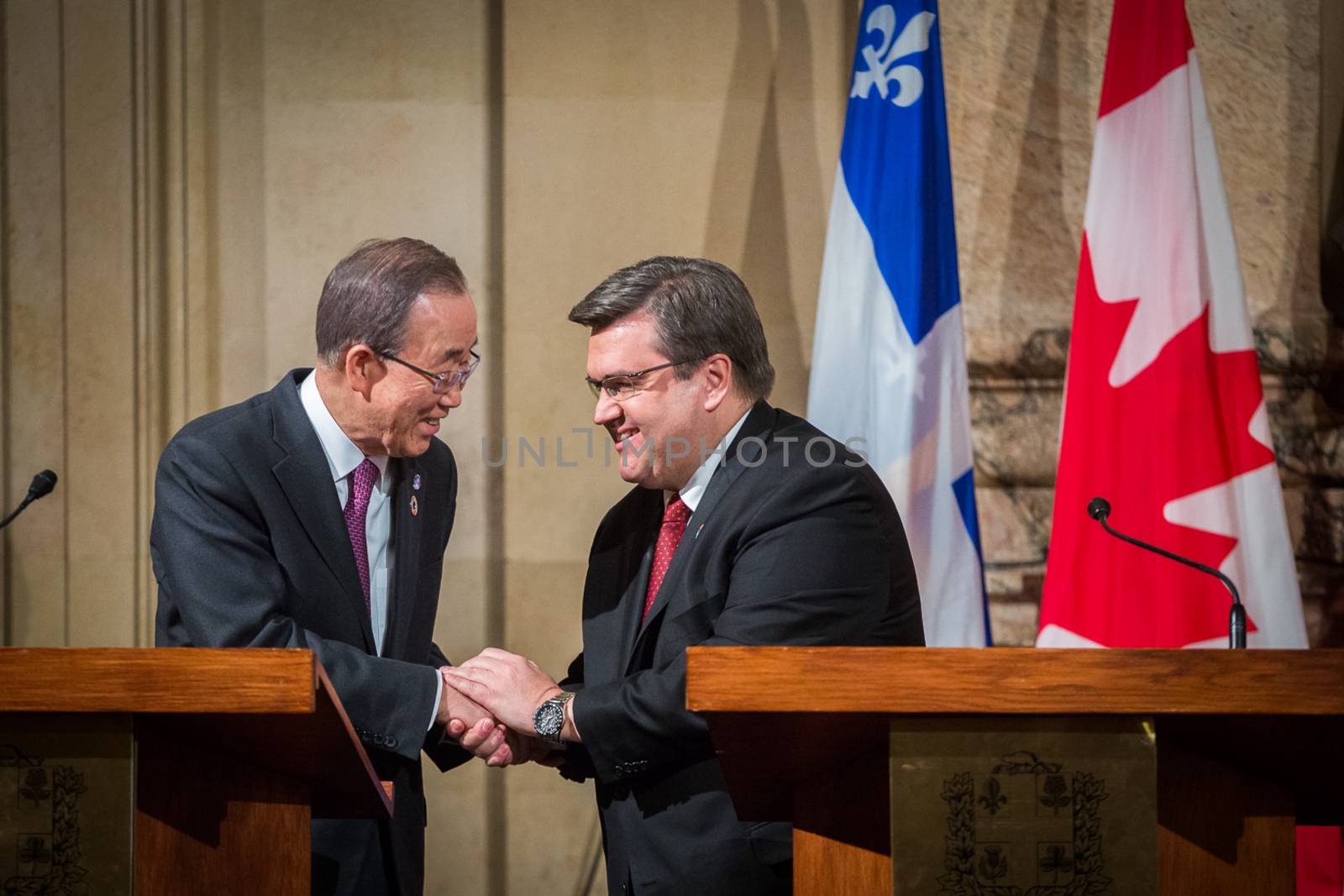 CANADA, Montréal: UN Secretary General Ban Ki-Moon (L) shakes hands with mayor of Montreal Denis Coderre (R) during a visit in Montreal on February 12, 2016.
