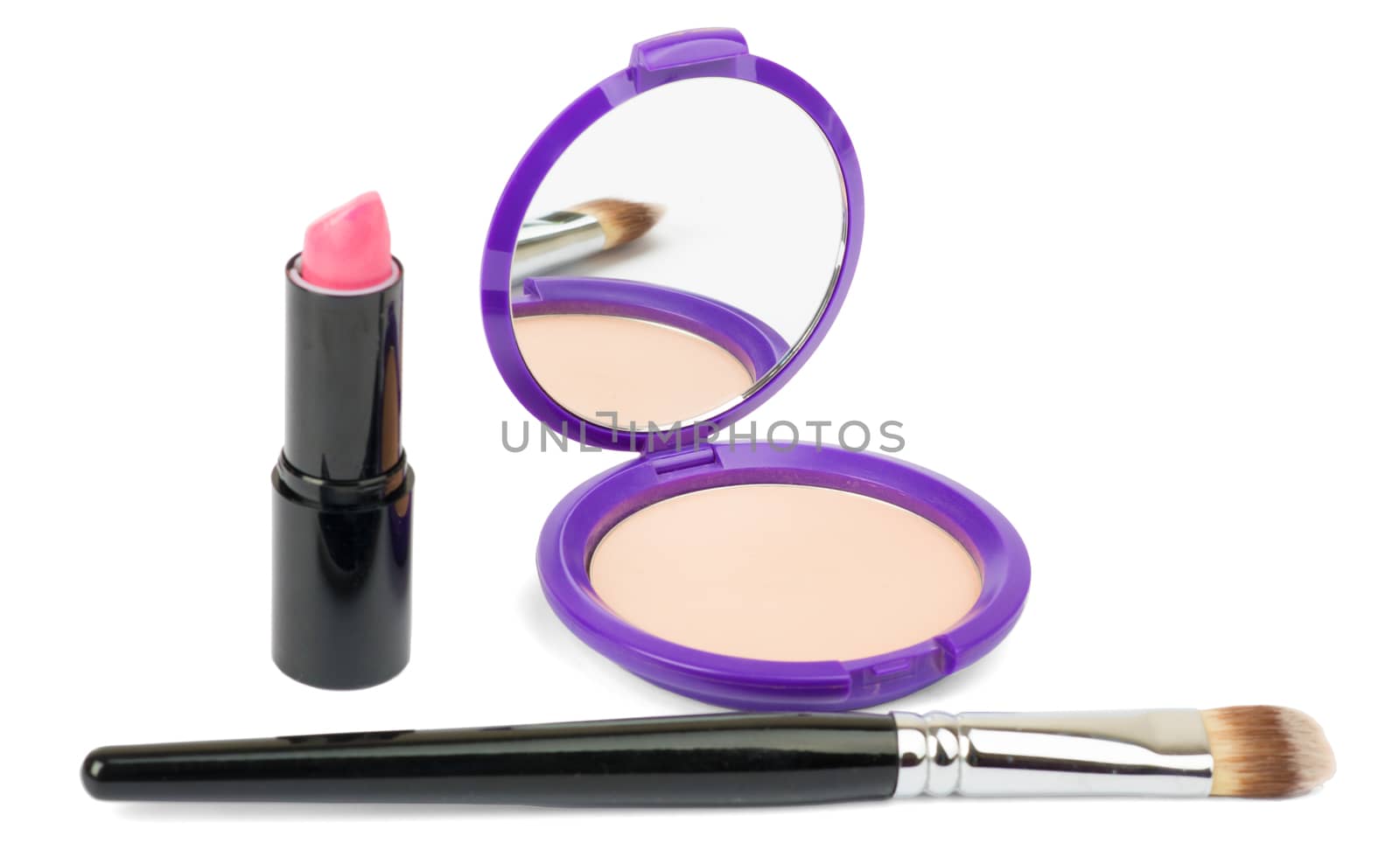 Cosmetics accessories, brush, lipstick on white by cherezoff